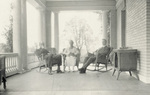 Katharine Wright and Griffith Brewer sitting on porch