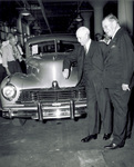 Viewing first 1946 model Hudson automobile off assembly line