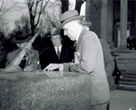 Orville Wright and Dr. Kettering look at sundial
