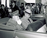 General Kenny and Orville Wright riding in automobile