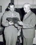 Orville Wright receives plaque from General Craigie