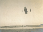 Side view of Wright Model A Flyer in flight