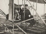 Leon Bollee testing the motor of the Wright Flyer