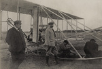 Leon Bollee and Hart O. Berg in front of the Wright Flyer