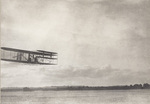 Wright Flyer flying into view