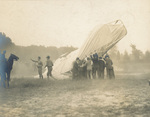 Removing Wright Model A Flyer wreckage from injured men