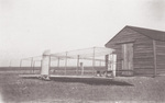 Right front view of Wright 1911 glider sitting on the sand