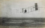 Left rear view of Wright 1911 glider in flight