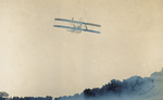 Rear view of Wright Model A Flyer in flight