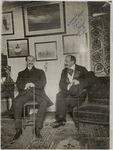 Orville Wright Smiling, seated with Hart O. Berg
