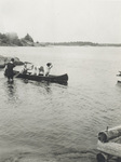 Orville Wright and Scipio in a Canoe