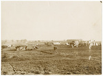 Dismantled aircraft in field