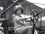 Mabel Hall Ely sitting at the controls of a Curtiss aircraft at the Harvard-Boston Aero Meet, August - September, 1911