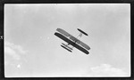 Orville Wright Flying a Wright Model A/B Airplane at Huffman Prairie, June, 1910 by Charles Wald
