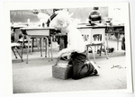 Young student kneeling