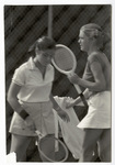 Two students with tennis rackets
