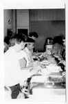 Staff and students at a buffet