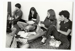 Students sitting on the floor