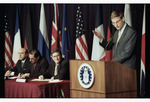 Carl Bildt at Podium with Ivanov, Blot, and Holbrooke Seated at the Signing of the Dayton Peace Agreement by Dayton Daily News and Jan Underwood