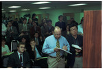 Members of the Press Gathered Around a TV at the Signing of the Dayton Peace Agreement by Dayton Daily News and Jan Underwood