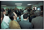 Members of the Press Watching President Clinton on a TV at the Signing of the Dayton Peace Agreement by Dayton Daily News and Jan Underwood