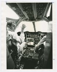 Chuck Masuga Sitting in the B-1A's Pilot Seat by Dayton Daily News and Bill Waugh