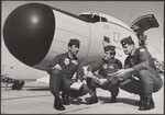 Three Men in Front of a Boeing C-135 Stratolifter by Dayton Daily News and Bill Shepherd