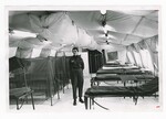 Lt. Sandy Hyre Stands in a Tempra-tent by Dayton Daily News and Ed Roberts