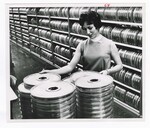 Magnetic Tape Librarian Selects a Reel by Dayton Daily News and Walt Kleine