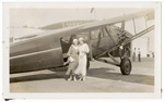 Two women with airplane