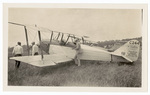 Men with biplane