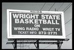 WSU Basketball Advertisement on Billboard on Woodman Dr. by The Center for Teaching and Learning